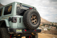 Load image into Gallery viewer, DV8 Offroad 18-25 Jeep Wrangler JL Spare Tire Carrier