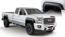 Load image into Gallery viewer, Bushwacker 15-18 GMC Sierra 2500 HD Extend-A-Fender Style Flares 4pc 78.8/97.6in Bed - Black