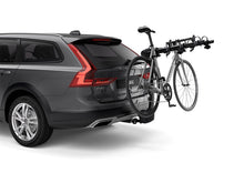 Load image into Gallery viewer, Thule Apex XT 4 - Hanging Hitch Bike Rack w/HitchSwitch Tilt-Down (Up to 4 Bikes) - Black